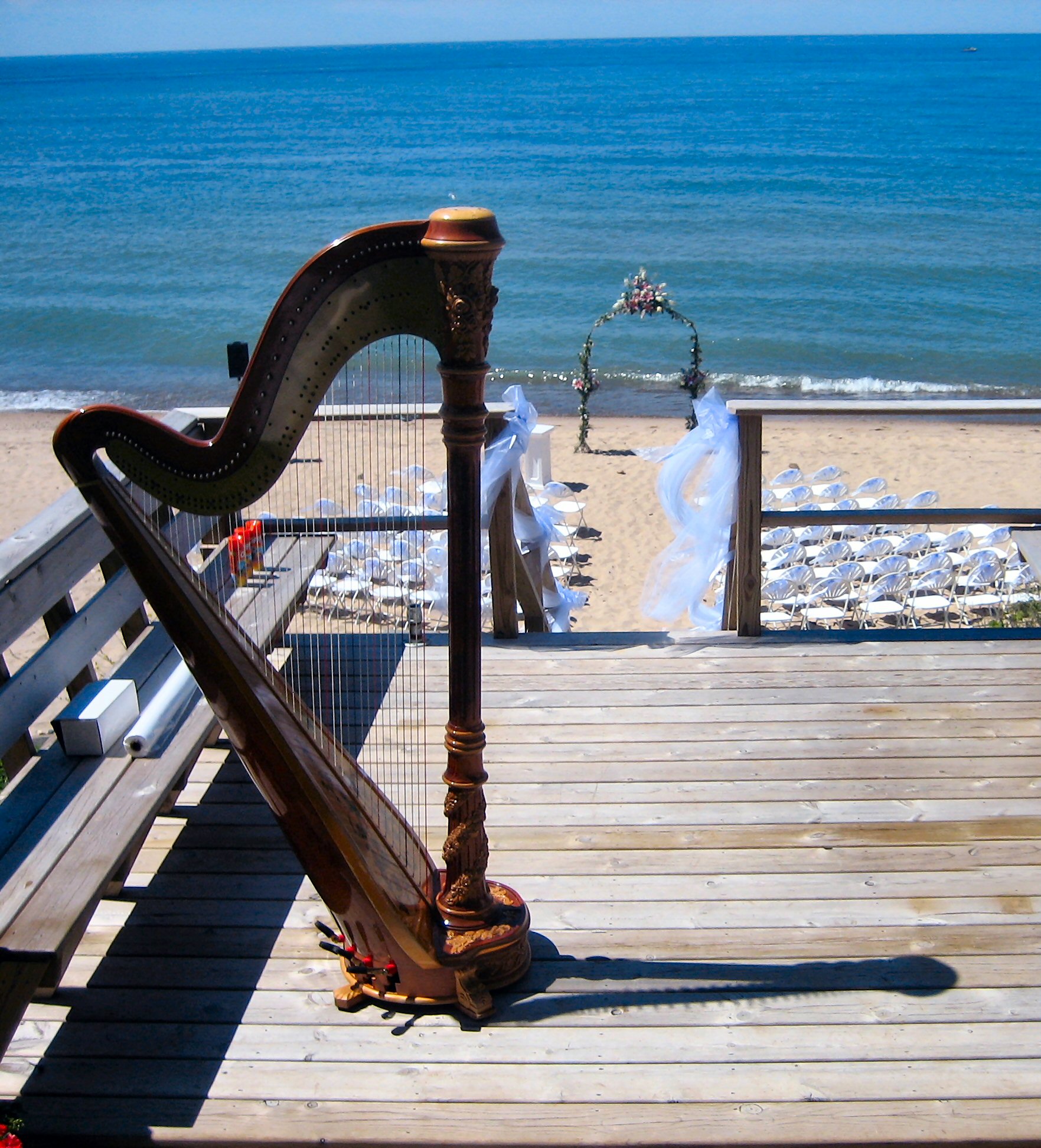 Wedding ceremony on the beach with harp music